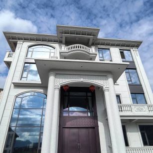 湖北白麻别墅外墙干挂石材效果示例